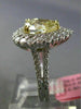 LARGE GIA 4.25CT WHITE & FANCY YELLOW DIAMOND 18KT TWO TONE GOLD ENGAGEMENT RING