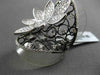 ANTIQUE MASSIVE 1.69CT DIAMOND 18KT BLACK & WHITE GOLD 3D FLORAL ETOILE RING