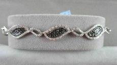 ANTIQUE .88CTW 18KT BLACK & WHITE DIAMOND LEAF DESIGN WHITE GOLD BRACELET