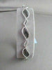ANTIQUE .88CTW 18KT BLACK & WHITE DIAMOND LEAF DESIGN WHITE GOLD BRACELET