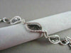 ANTIQUE .88CTW 18KT BLACK & WHITE DIAMOND LEAF DESIGN WHITE GOLD BRACELET