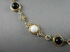 ANTIQUE 41.36CT FILIGREE CIRCLE ONYX & WHITE SAPPHIRE 14KT YELLOW GOLD NECKLACE