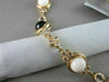 ANTIQUE 41.36CT FILIGREE CIRCLE ONYX & WHITE SAPPHIRE 14KT YELLOW GOLD NECKLACE