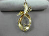 ANTIQUE LARGE DIAMOND & AAA EMERALD 18KT 2 TONE GOLD MUSICAL NOTE BROOCH #22500