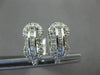 WIDE 1.36CT ROUND & PRINCESS DIAMOND 14KT WHITE GOLD LOVE KNOT HANGING EARRINGS