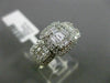 ESTATE WIDE .89CT ROUND & BAGUETTE DIAMOND 18KT WHITE GOLD HALO PROMISE RING