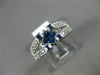1.08CT ROUND DIAMOND & AAA PRINCESS SAPPHIRE 14KT WHITE GOLD INVISIBLE FUN RING