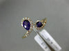.68CT DIAMOND & AAA ROUND & PEAR SHAPE AMETHYST 14KT ROSE GOLD CRISS CROSS RING