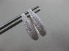ESTATE .71CT DIAMOND 18KT WHITE GOLD CLASSIC ELONGATED PAVE OVAL HUGGIE EARRINGS
