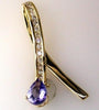 1.02CT DIAMOND & AAA TANZANITE 14KT YELLOW GOLD CRISS CROSS SLIDER FUN PENDANT