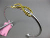 ESTATE .73CT WHITE & FANCY YELLOW DIAMOND 18KT 2 TONE GOLD INFINITY LOVE BANGLE