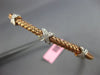 ESTATE .27CT DIAMOND 14KT WHITE & ROSE GOLD X LOVE WAVE FLEXIBLE BANGLE BRACELET
