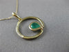 ESTATE .03CT DIAMOND & AAA EMERALD 14KT YELLOW GOLD CIRCLE OF LIFE FUN PENDANT