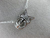 ESTATE .15CT DIAMOND 14K WHITE GOLD 3D DANCING DIAMOND XO FLOATING LOVE NECKLACE