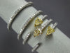ESTATE LARGE 1.04CT WHITE & FANCY YELLOW DIAMOND 18KT TWO TONE GOLD 3D LOVE RING