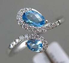 ESTATE .81CT DIAMOND & AAA EXTRA FACET BLUE TOPAZ 14KT WHITE GOLD SNAKE FUN RING
