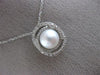 ESTATE .18CT DIAMOND & AAA SOUTH SEA PEARL 14KT WHITE GOLD 3D LOVE KNOT PENDANT