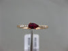 .34CT ROUND DIAMOND & AAA PEAR SHAPE RUBY 14KT ROSE GOLD FRIENDSHIP PROMISE RING