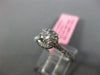 ESTATE .81CT ROUND DIAMOND 18KT WHITE GOLD 4 PRONG HALO CLASSIC ENGAGEMENT RING