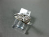 ESTATE .25CT DIAMOND 14KT WHITE GOLD DOUBLE FLOWER CLUSTER CRISS CROSS LOVE RING