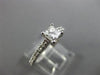 ESTATE .66CT ROUND & PRINCESS DIAMOND 14KT WHITE GOLD SOLITAIRE ENGAGEMENT RING