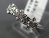 ESTATE .15CT DIAMOND 18KT WHITE GOLD STAR FLOWER PAST PRESENT FUTURE RING #11635