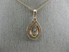 .77CT DIAMOND & AAA OVAL MORGANITE 14KT ROSE GOLD 3D INFINITY TEAR DROP PENDANT