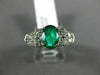 ESTATE 1.21CT DIAMOND & AAA OVAL EMERALD 14KT WHITE GOLD 3D LOVE ENGAGEMENT RING
