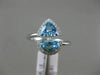 1.73CT DIAMOND & AAA BLUE TOPAZ 14K WHITE GOLD 3D TRILLION HALO CRISS CROSS RING