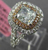 LARGE GIA 2.02CT FANCY COLOR DIAMOND 18KT WHITE & ROSE GOLD HALO ENGAGEMENT RING