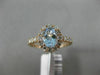 1.12CT DIAMOND & AAA AQUAMARINE 14KT ROSE GOLD OVAL HALO CLASSIC ENGAGEMENT RING