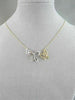 ANTIQUE 18KT WHITE & YELLOW DOUBLE BUTTERFLY DIAMOND NECKLACE