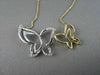 ANTIQUE 18KT WHITE & YELLOW DOUBLE BUTTERFLY DIAMOND NECKLACE