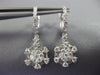 LARGE 14KT WHITE GOLD HUGGIE HANGING EARRINGS. 3D FLOWER OCTAGON DESIGN