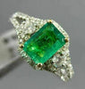 1.44CT DIAMOND & COLOMBIAN EMERALD 14KT 2 TONE GOLD 3 STONE HALO ENGAGEMENT RING