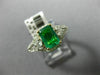 1.44CT DIAMOND & COLOMBIAN EMERALD 14KT 2 TONE GOLD 3 STONE HALO ENGAGEMENT RING