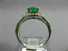 1.44CT DIAMOND & COLOMBIAN EMERALD 14KT 2 TONE GOLD 3 STONE HALO ENGAGEMENT RING