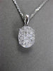 ESTATE .40CT DIAMOND 18KT WHITE GOLD FLOATING CLUSTER FILIGREE OVAL PENDANT