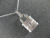 ESTATE LARGE .70CT ROUND & BAGUETTE DIAMOND 18KT WHITE GOLD 3D LOCK LOVE PENDANT