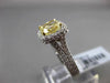 ESTATE 2.26CTW GIA FANCY YELLOW DIAMOND 18KT WHITE GOLD HALO ENGAGEMENT RING