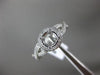 ESTATE .38CT DIAMOND 14KT WHITE GOLD HALO INFINITY SEMI MOUNT ENGAGEMENT RING