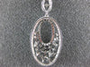 ESTATE .64CT ROUND & BAGUETTE DIAMOND 14KT WHITE GOLD 3D OPEN FILIGREE PENDANT