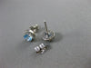 ESTATE WIDE .78CT DIAMOND & BLUE TOPAZ 14KT WHITE GOLD ROUND HALO STUD EARRINGS