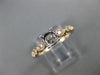 ESTATE .20CT DIAMOND 14KT WHITE & ROSE GOLD OPEN FILIGREE FLOWER ENGAGEMENT RING