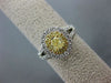 WIDE 1.36CT WHITE & FANCY YELLOW DIAMOND 18KT TWO TONE GOLD HALO ENGAGEMENT RING
