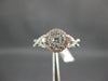ESTATE .54CT WHITE & PINK DIAMOND 14KT WHITE GOLD 3D CLUSTER INFINITY LOVE RING