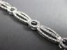 ESTATE WIDE .96CT DIAMOND 14KT WHITE GOLD CLASSIC CIRCLE OF LIFE TENNIS BRACELET