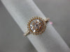 ESTATE .45CT ROUND & BAGUETTE DIAMOND 18KT YELLOW GOLD 3D FLOWER HALO LOVE RING
