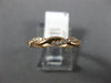 ESTATE .15CT DIAMOND 14K ROSE GOLD SWIRL INFINITY SEMI ETERNITY ANNIVERSARY RING