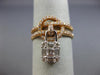 ESTATE WIDE .94CT DIAMOND 18KT WHITE & ROSE GOLD 3D LOVE KNOT LOCK FLOATING RING